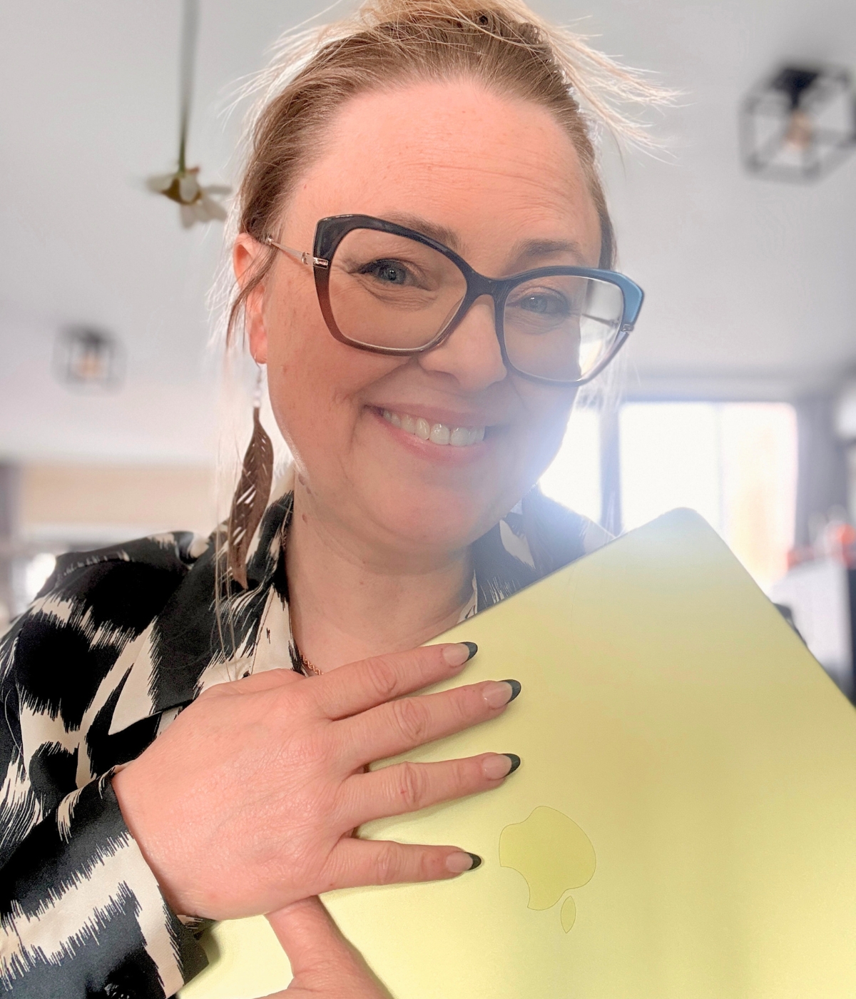 Gina Dunn at her desk, ready to work
